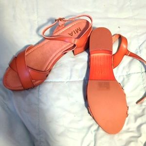 New leather and wood sandals